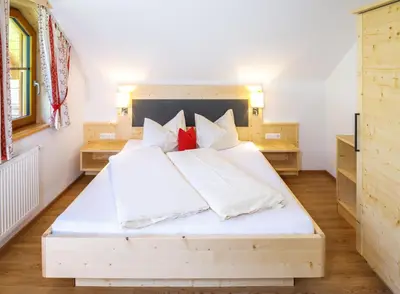 Ein Bett oder Betten in einem Zimmer der Unterkunft Bauernhof Mandlberger