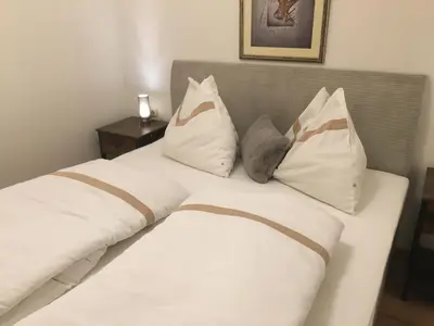 Ein Bett oder Betten in einem Zimmer der Unterkunft Haus Christina