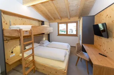 Ein Bett oder Betten in einem Zimmer der Unterkunft Juche! Ferienwohnungen