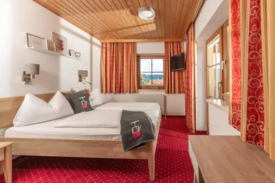 Ein Bett oder Betten in einem Zimmer der Unterkunft Haus Steirerland