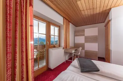Ein Bett oder Betten in einem Zimmer der Unterkunft Haus Steirerland