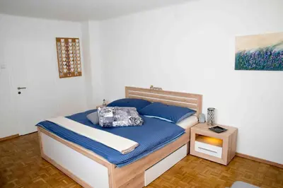 Ein Bett oder Betten in einem Zimmer der Unterkunft FERIENWOHNUNG KIM SCHLADMING