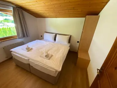 Ein Bett oder Betten in einem Zimmer der Unterkunft Flachau Lodge