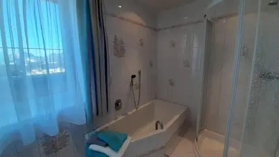 Ein Badezimmer in der Unterkunft Lederhof