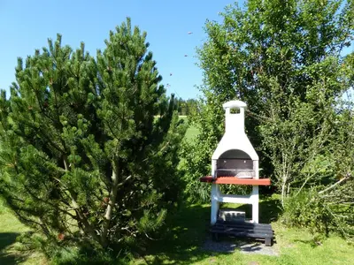 Ein Garten an der Unterkunft Ferienhaus Wohleser