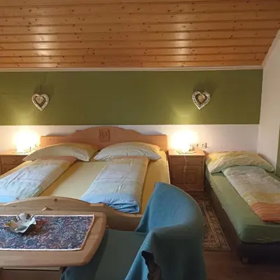 Ein Bett oder Betten in einem Zimmer der Unterkunft Ferienhaus Gstoderblick