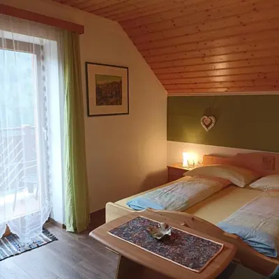 Ein Bett oder Betten in einem Zimmer der Unterkunft Ferienhaus Gstoderblick