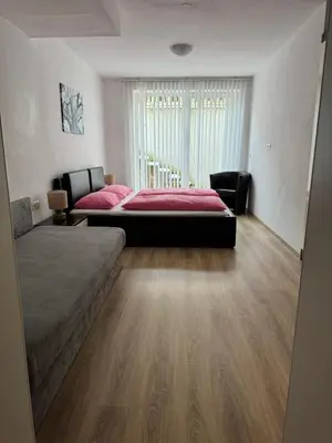 Ein Bett oder Betten in einem Zimmer der Unterkunft Haus Senel