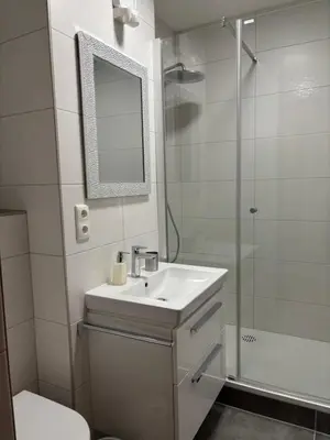 Ein Badezimmer in der Unterkunft Ferienwohnung Held
