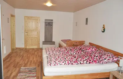 Ein Bett oder Betten in einem Zimmer der Unterkunft Mostheuriger Steyrdurchbruchalm