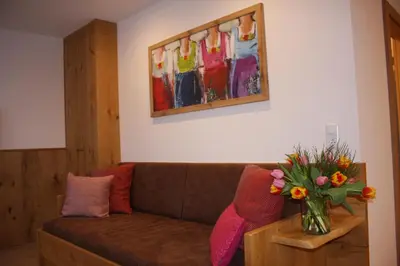 Ein Sitzbereich in der Unterkunft Haus Berghoamat