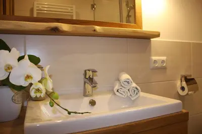 Ein Badezimmer in der Unterkunft Haus Berghoamat