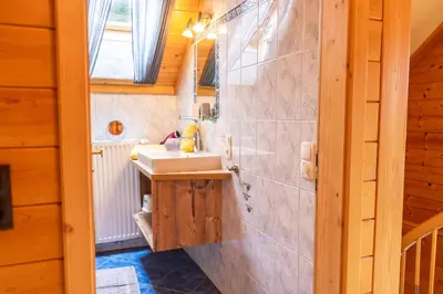 Ein Badezimmer in der Unterkunft Bergchalet am Tonimörtlhof