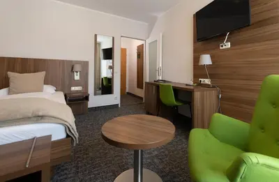 Ein Bett oder Betten in einem Zimmer der Unterkunft Seehotel im Weyer