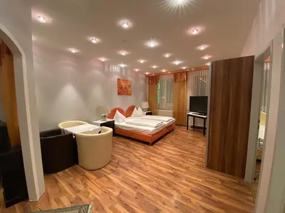 Ein Bett oder Betten in einem Zimmer der Unterkunft Ferienappartement Auerhahn