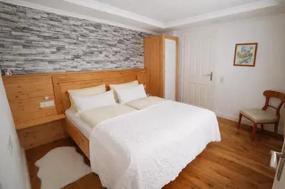 Ein Bett oder Betten in einem Zimmer der Unterkunft Land - Haus