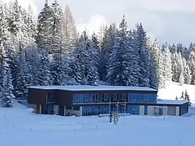 Höss-Alpin-Lodge im Winter