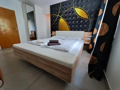Ein Bett oder Betten in einem Zimmer der Unterkunft ALPINpelso