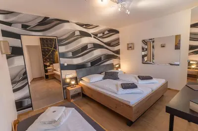 Ein Bett oder Betten in einem Zimmer der Unterkunft ALPINpelso