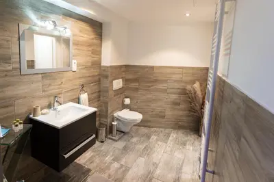 Ein Badezimmer in der Unterkunft ALPINpelso