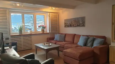 Ein Sitzbereich in der Unterkunft Pension Edelweiss, apartment Amsterdam 4-6 pers