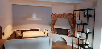Ein Bett oder Betten in einem Zimmer der Unterkunft Pension Edelweiss, apartment Amsterdam 4-6 pers