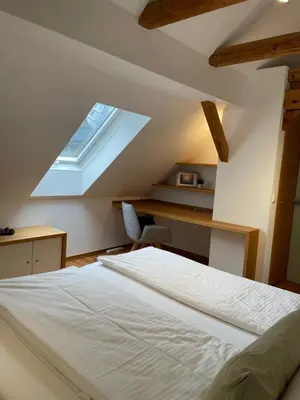 Ein Bett oder Betten in einem Zimmer der Unterkunft Loft Krämerhaus Annaberg, Dachstein West