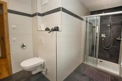 Ein Badezimmer in der Unterkunft Alpenherz