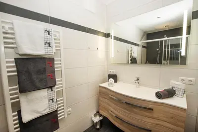 Ein Badezimmer in der Unterkunft Alpenherz