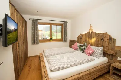 Ein Bett oder Betten in einem Zimmer der Unterkunft Alpenherz