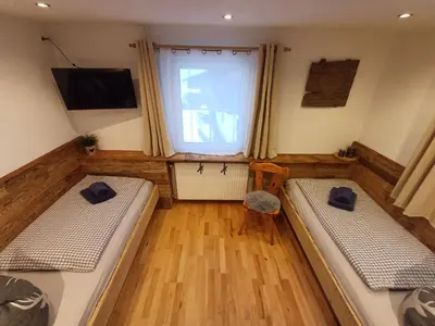 Ein Bett oder Betten in einem Zimmer der Unterkunft Panoramahof Gupf