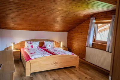 Ein Bett oder Betten in einem Zimmer der Unterkunft Ferienwohnung Schoberhof