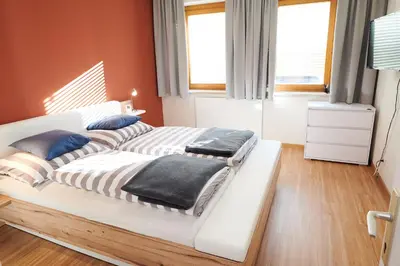 Ein Bett oder Betten in einem Zimmer der Unterkunft Ferienwohnung Klauber Schöder