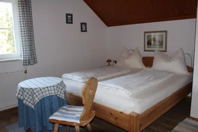 Ein Bett oder Betten in einem Zimmer der Unterkunft Ferienhaus Margotti