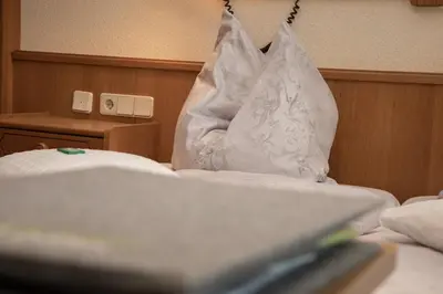 Ein Bett oder Betten in einem Zimmer der Unterkunft Rosspointnerhof