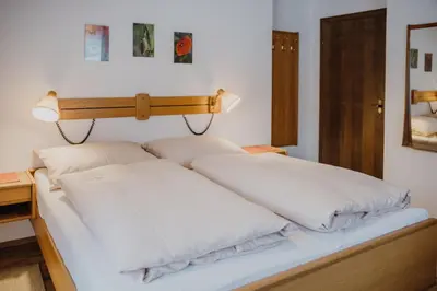 Ein Bett oder Betten in einem Zimmer der Unterkunft Ferienwohnung Inge Gapp