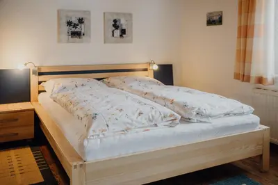 Ein Bett oder Betten in einem Zimmer der Unterkunft Ferienwohnung Inge Gapp