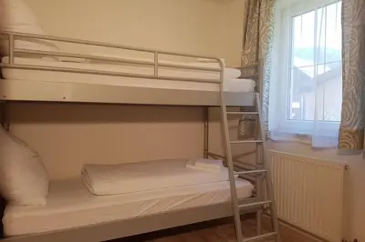 Ein Bett oder Betten in einem Zimmer der Unterkunft Ferienwohnung Heindl