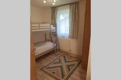 Ein Bett oder Betten in einem Zimmer der Unterkunft Ferienwohnung Heindl