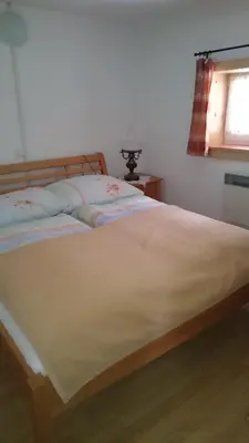 Ein Bett oder Betten in einem Zimmer der Unterkunft Knödl-Alm Waldhäusl
