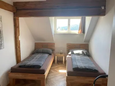 Ein Bett oder Betten in einem Zimmer der Unterkunft Haus Kampl - Appartement Aussee