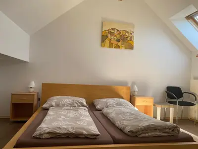 Ein Bett oder Betten in einem Zimmer der Unterkunft Haus Kampl - Appartement Aussee