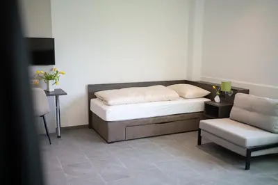 Ein Bett oder Betten in einem Zimmer der Unterkunft eee Hotel Liezen