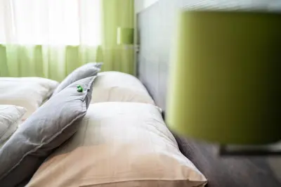 Ein Bett oder Betten in einem Zimmer der Unterkunft eee Hotel Liezen