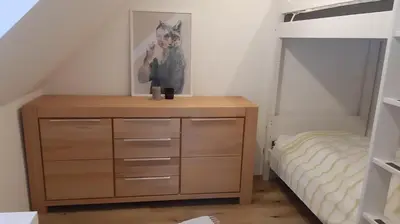 Ein Bett oder Betten in einem Zimmer der Unterkunft Ferienhaus Gerlach