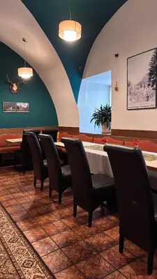 Ein Sitzbereich in der Unterkunft Gasthof Durigon
