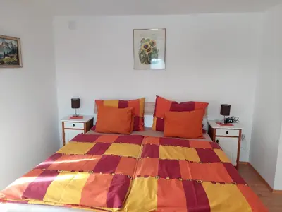 Ein Bett oder Betten in einem Zimmer der Unterkunft Waldhaus