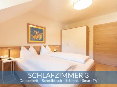 Ein Bett oder Betten in einem Zimmer der Unterkunft Heimathaus Dengg - Ferienwohnungen im Lungau - Ski & Wanderurlaub nahe Obertauern im Salzburger Land