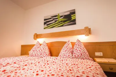 Ein Bett oder Betten in einem Zimmer der Unterkunft Hotel Pension Barbara
