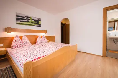 Ein Bett oder Betten in einem Zimmer der Unterkunft Hotel Pension Barbara
